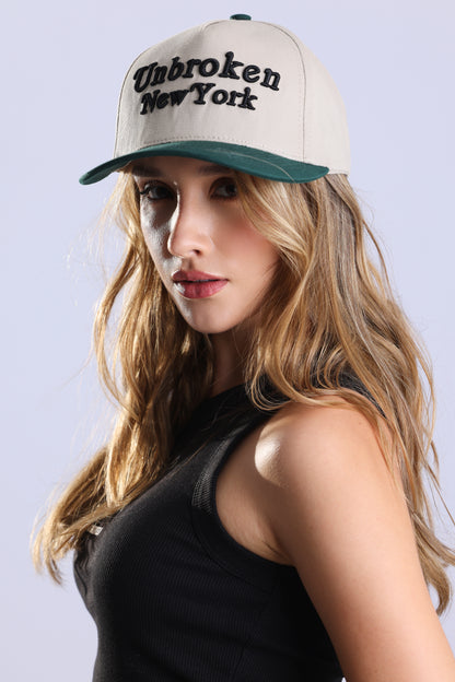 Unbroken central Cap